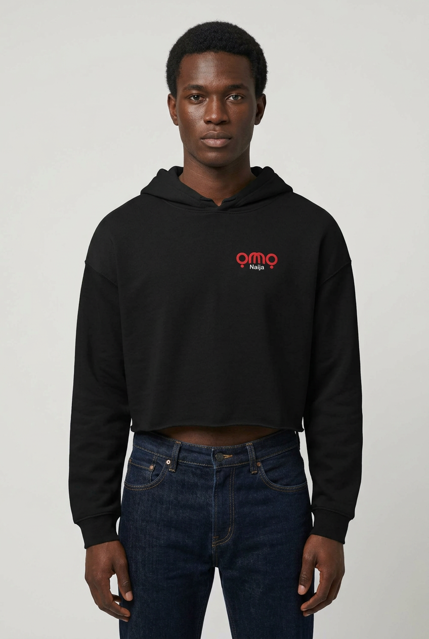 Black male model wearing the black Omo Naija cropped hoodie