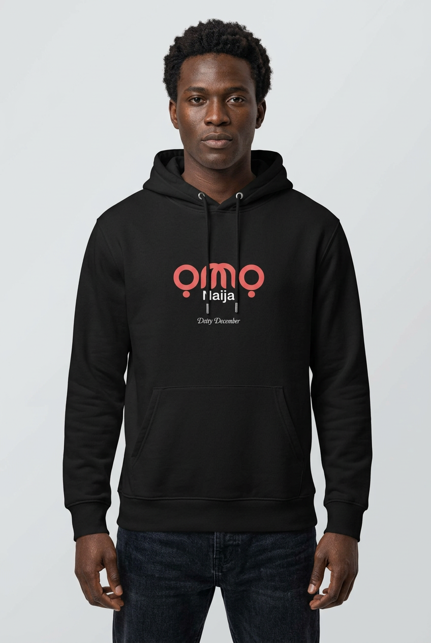 Black male model wearing the Detty December hoodie