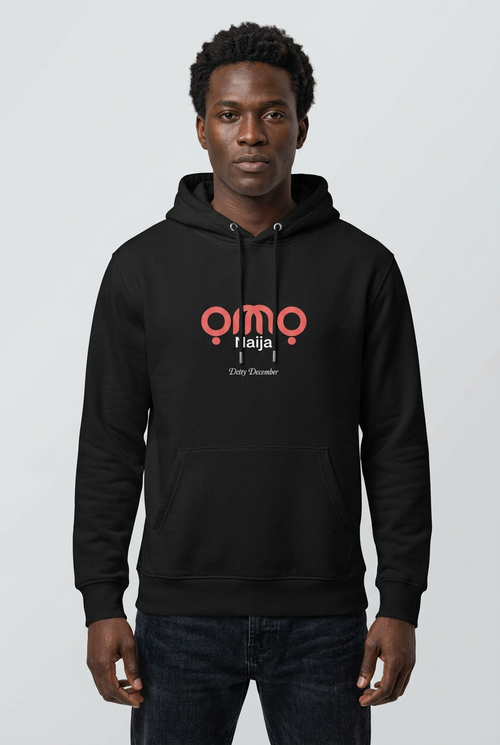 Black male model wearing the Detty December hoodie